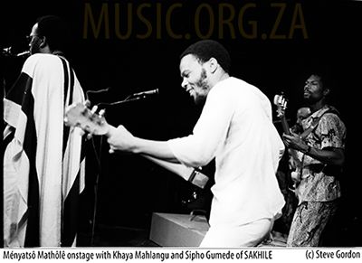 Menyatso onstage with Khaya Mahlangu (L) and Sipho Gumede (R) of Sakhile - &copy S.Gordon 1987